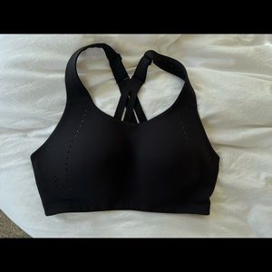Black Lululemon medium support sports bra. 34D.